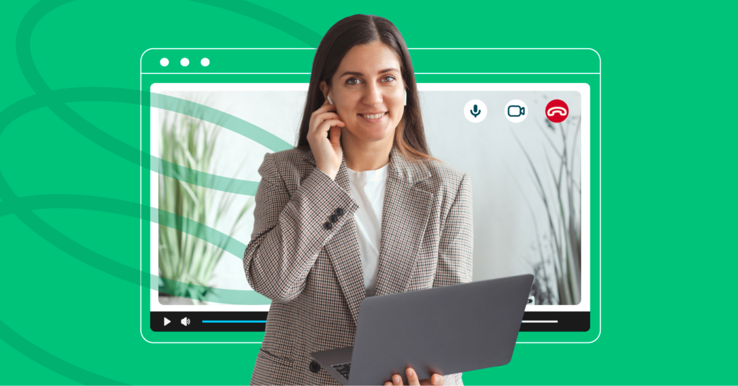A smiling young female professional holding a laptop with a computer screen of Training Simulation Software in the background