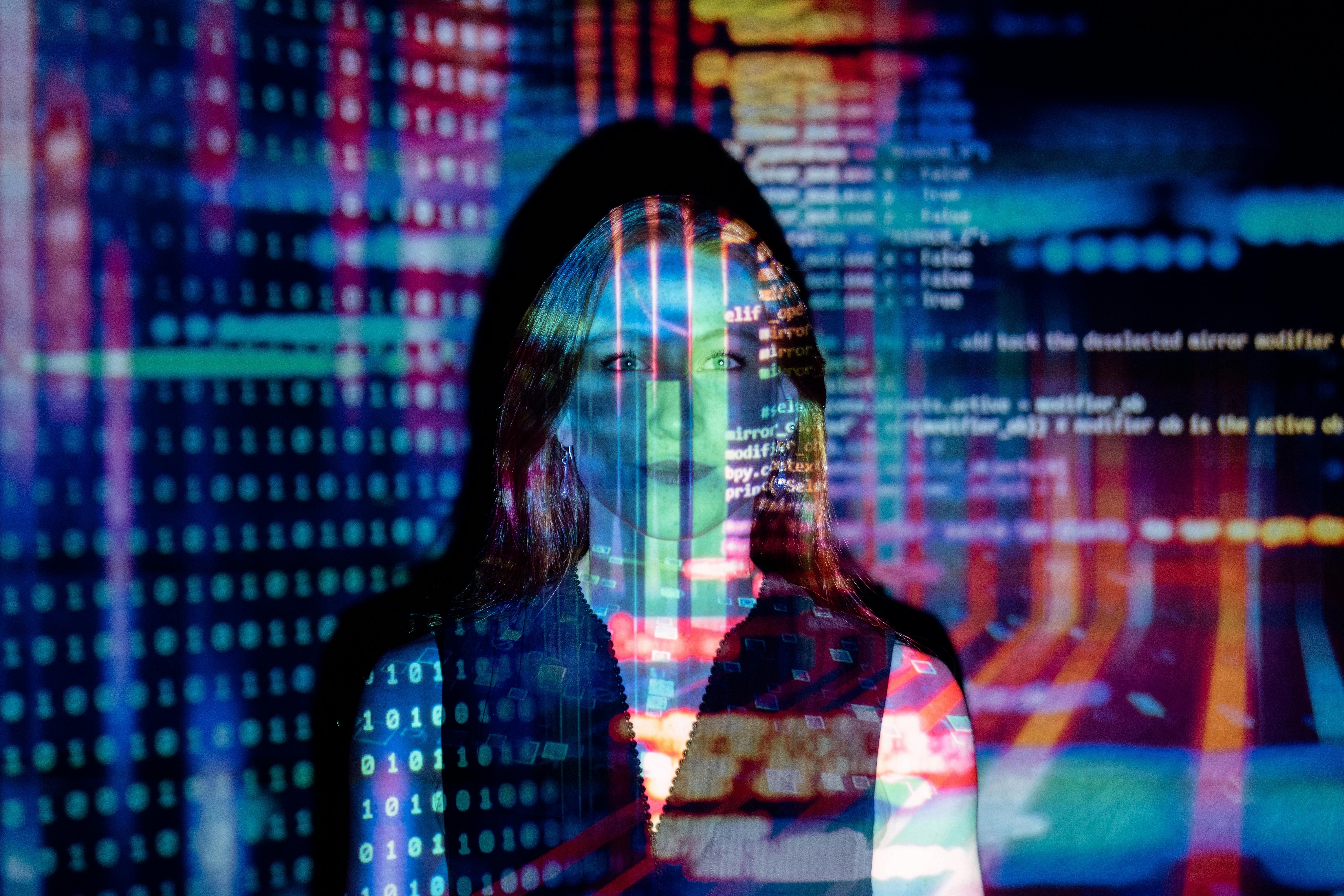 Image of woman with computer graphics projected onto her. What is an example of a personalized learning platform?
